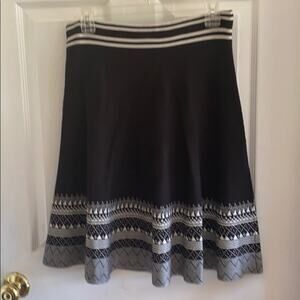 Sioni L black and white striped skirt